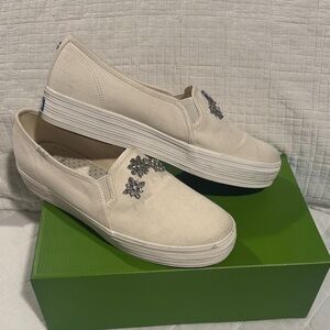 Elegant Women's White Slip-On Sneakers with Floral Accents